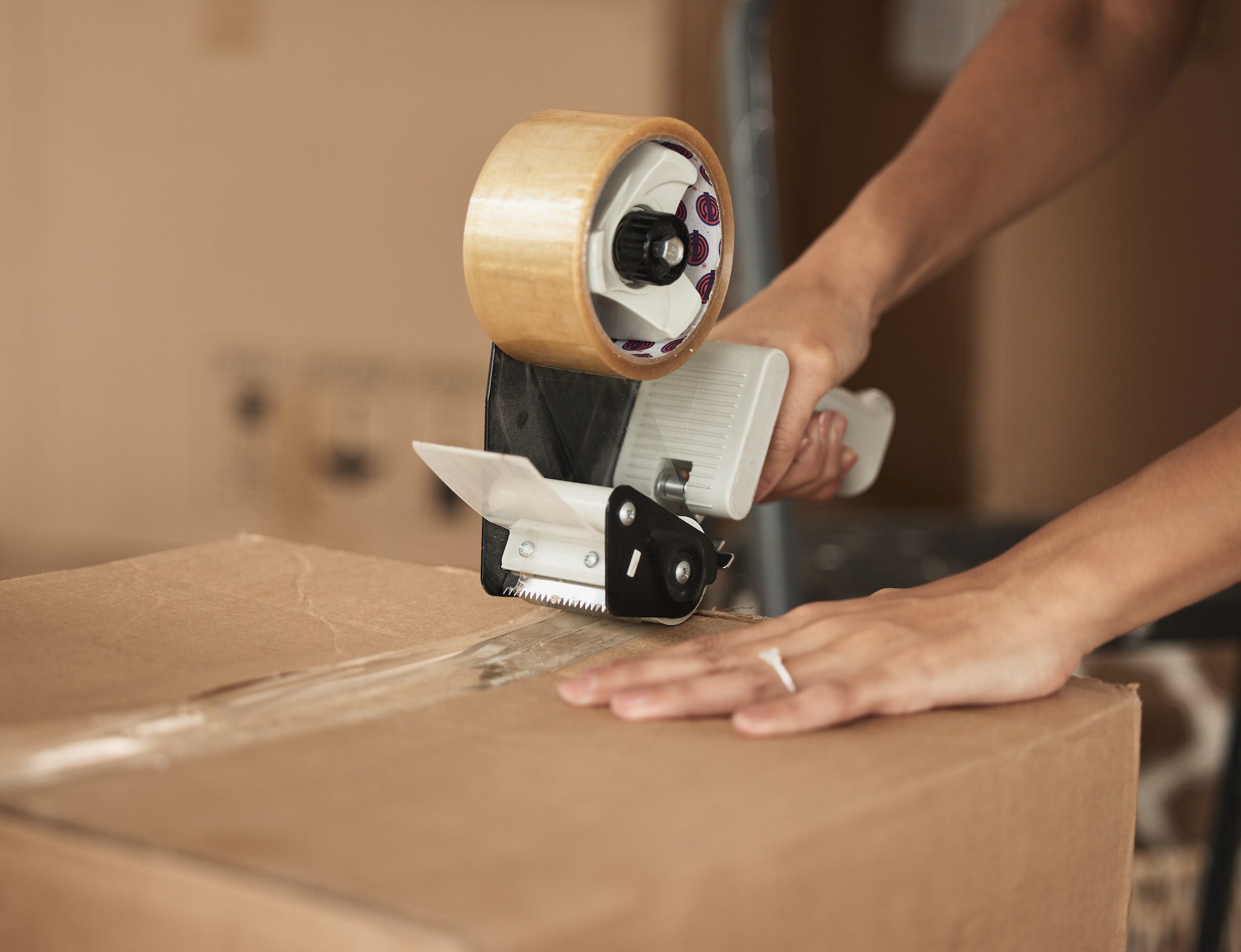 Packing Services Bronx professionally wrapping and sealing moving boxes